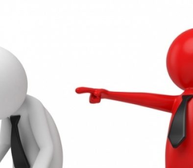 Red figure pointing accusingly at a white figure, illustrating a retaliatory lawsuit that Connecticut litigation privilege and the Connecticut anti-SLAPP statute may protect against